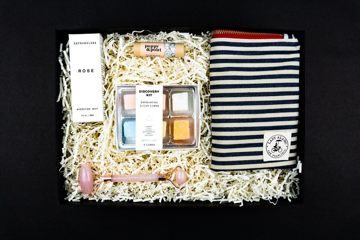 Powder Room box: rose mist, exfoliating sugar cubes, lip balm, and a striped zip pouch