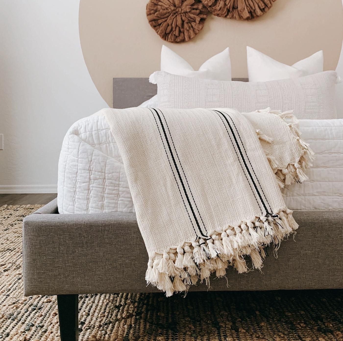 Striped Turkish throw on a bed